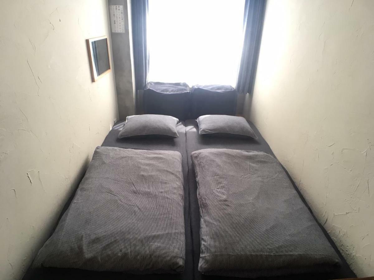 Guest House Golden Mile Hostel Амами Номер фото